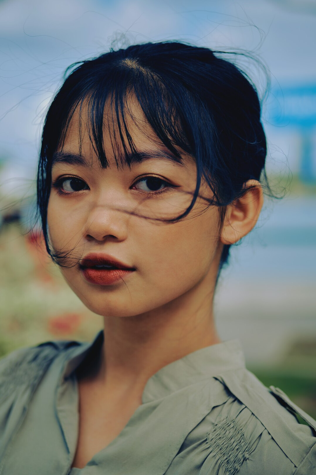 Portrait of a Japanese female editor in a modern office